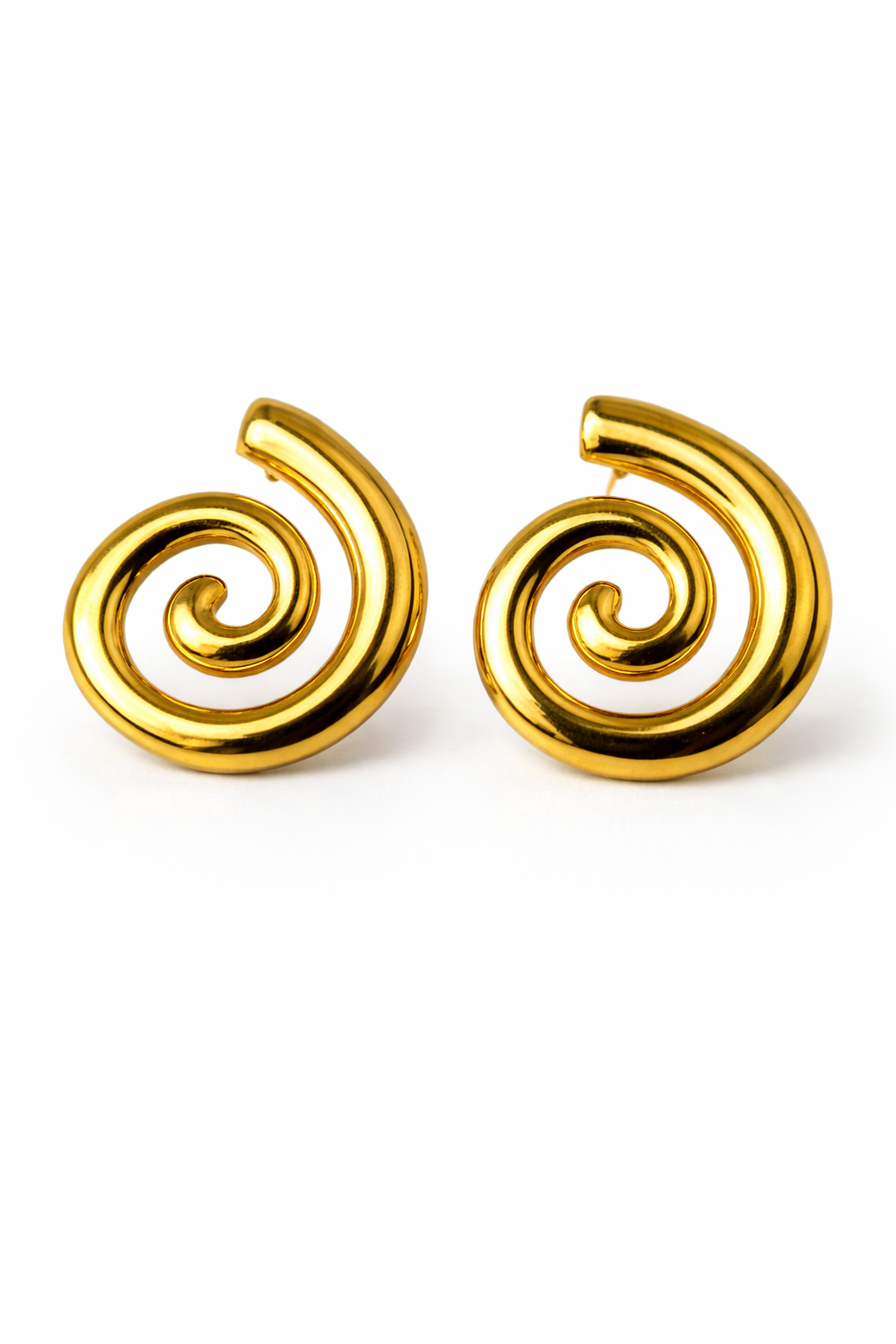 Pair of gold spiral earrings on a white background by Zenva
