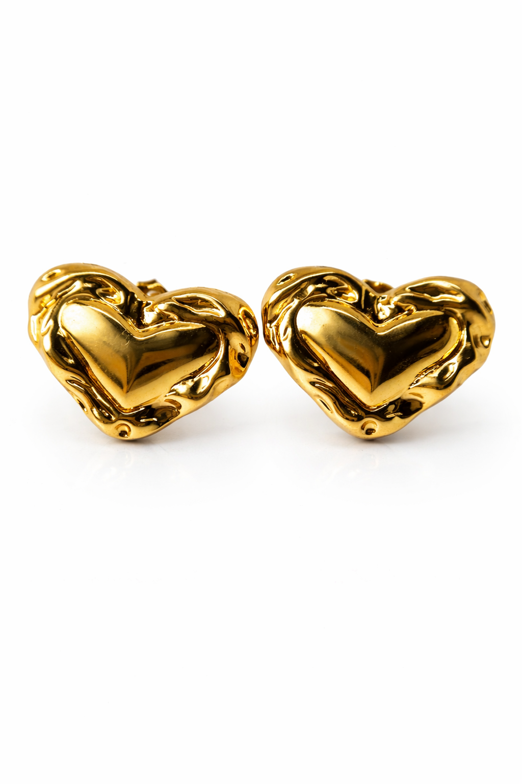 Pair of gold heart-shaped earrings on a white background by Zenva